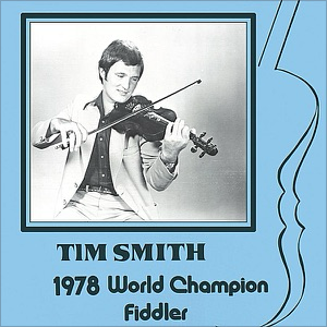 A picture of tim smith with his violin.