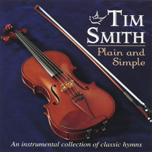 A violin and bow sitting on top of a blue sheet.